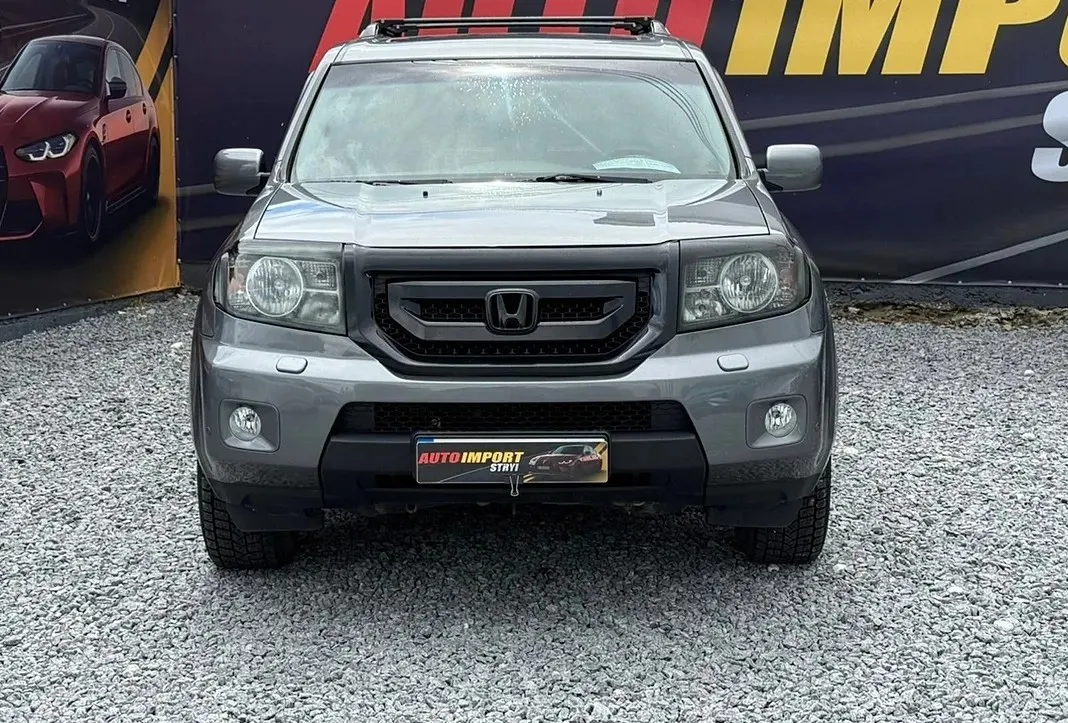 Honda Pilot 2009 — сріблястий сімимісний позашляховик