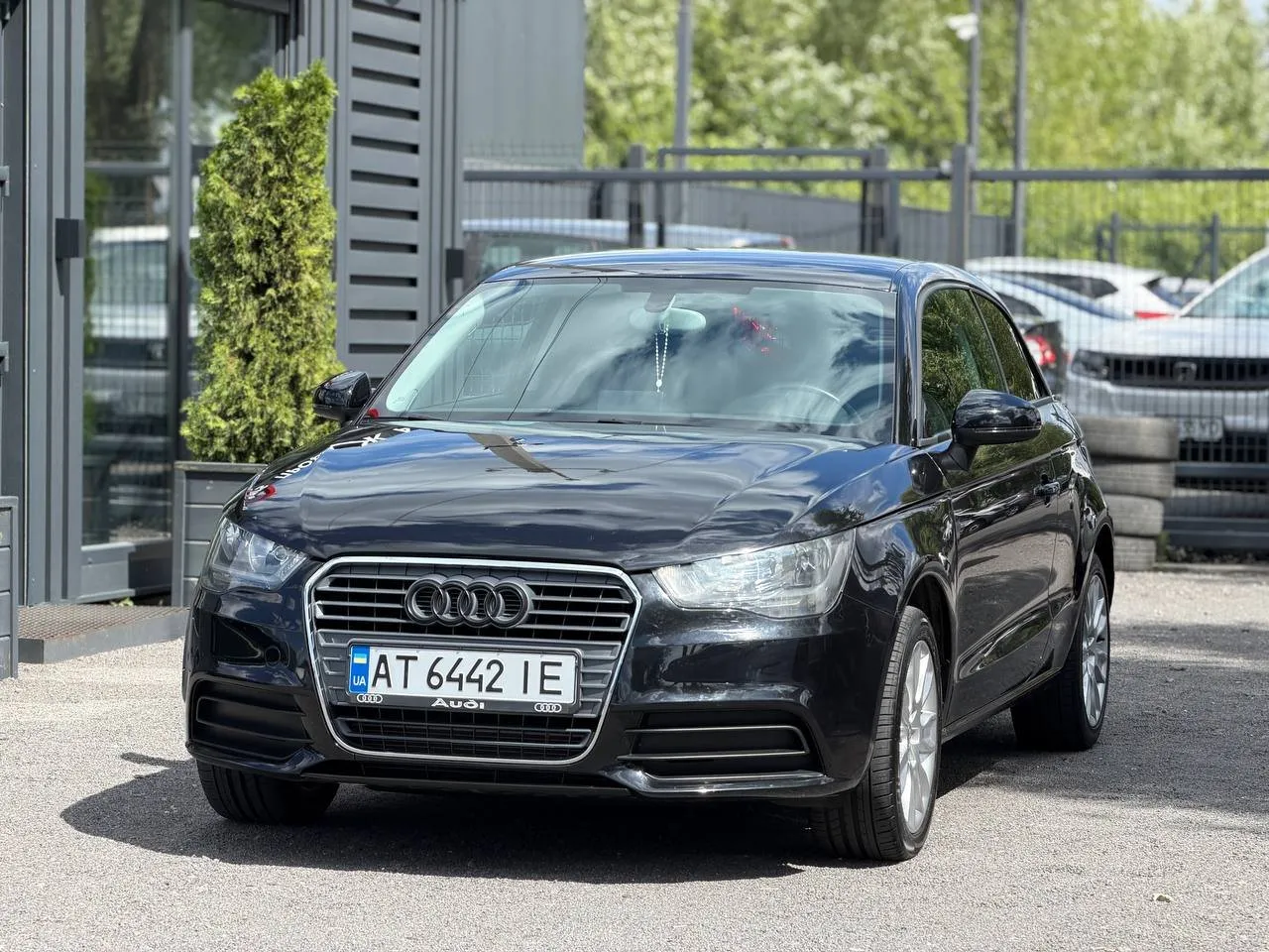 Audi A1 2010 — чорний хетчбек