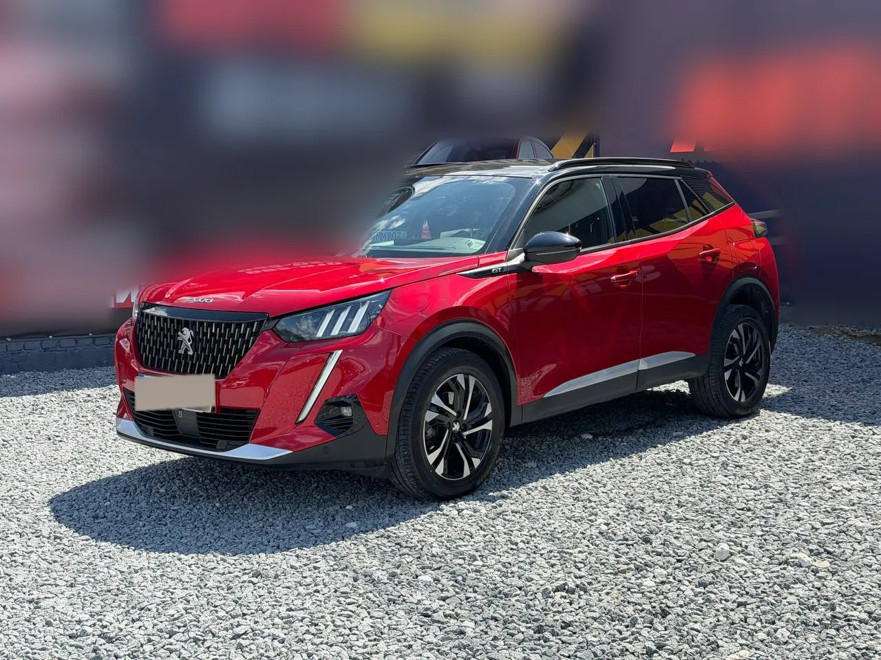 Peugeot 2008 2021 — червоний компактний кросовер у комплектації GT
